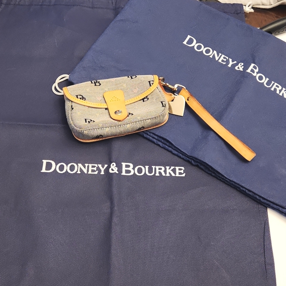 Pair of Pre-owned Dooney and Bourke Ex Large Dust Cover & Wristlet.